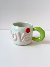 Load image into Gallery viewer, Handmade LOVE Ceramic Mug – Colorful Handle &amp; Flower Accent
