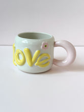 Load image into Gallery viewer, Handmade LOVE Ceramic Mug – Colorful Handle &amp; Flower Accent

