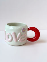 Load image into Gallery viewer, Handmade LOVE Ceramic Mug – Colorful Handle &amp; Flower Accent
