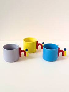 "Hi!" Mug – Playful Color Pop Cup with Character