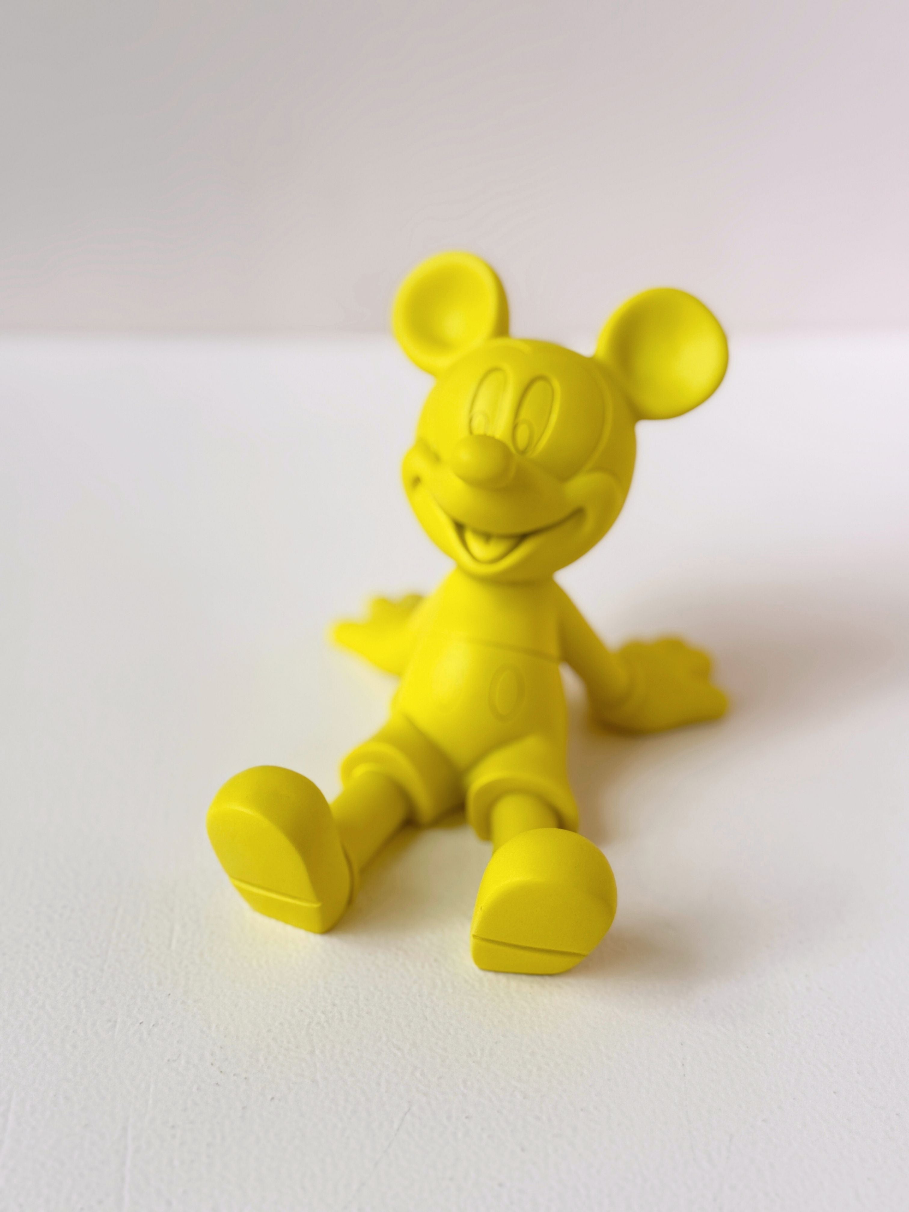 Playful Mickey-Inspired Phone Stand