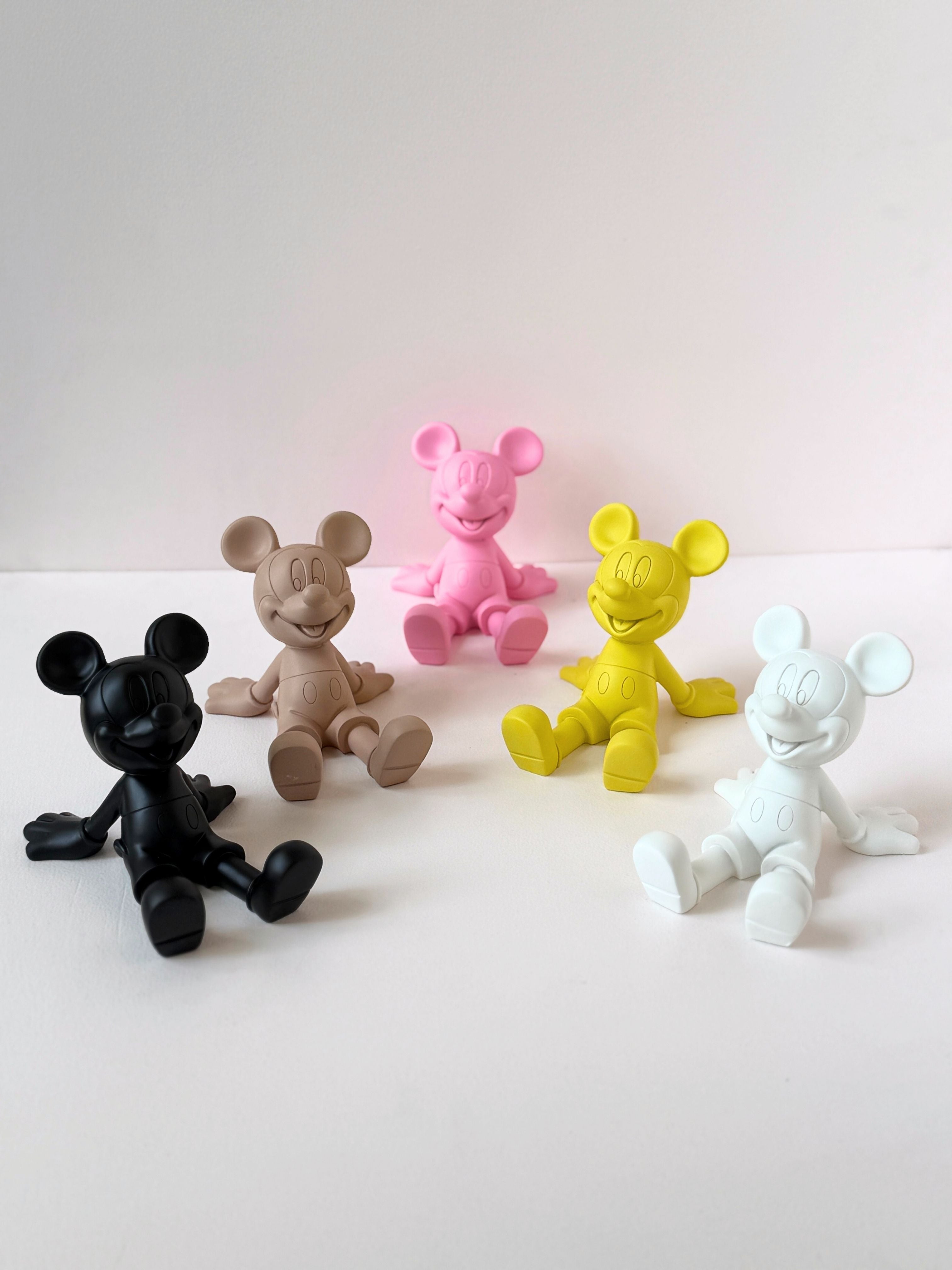 Playful Mickey-Inspired Phone Stand