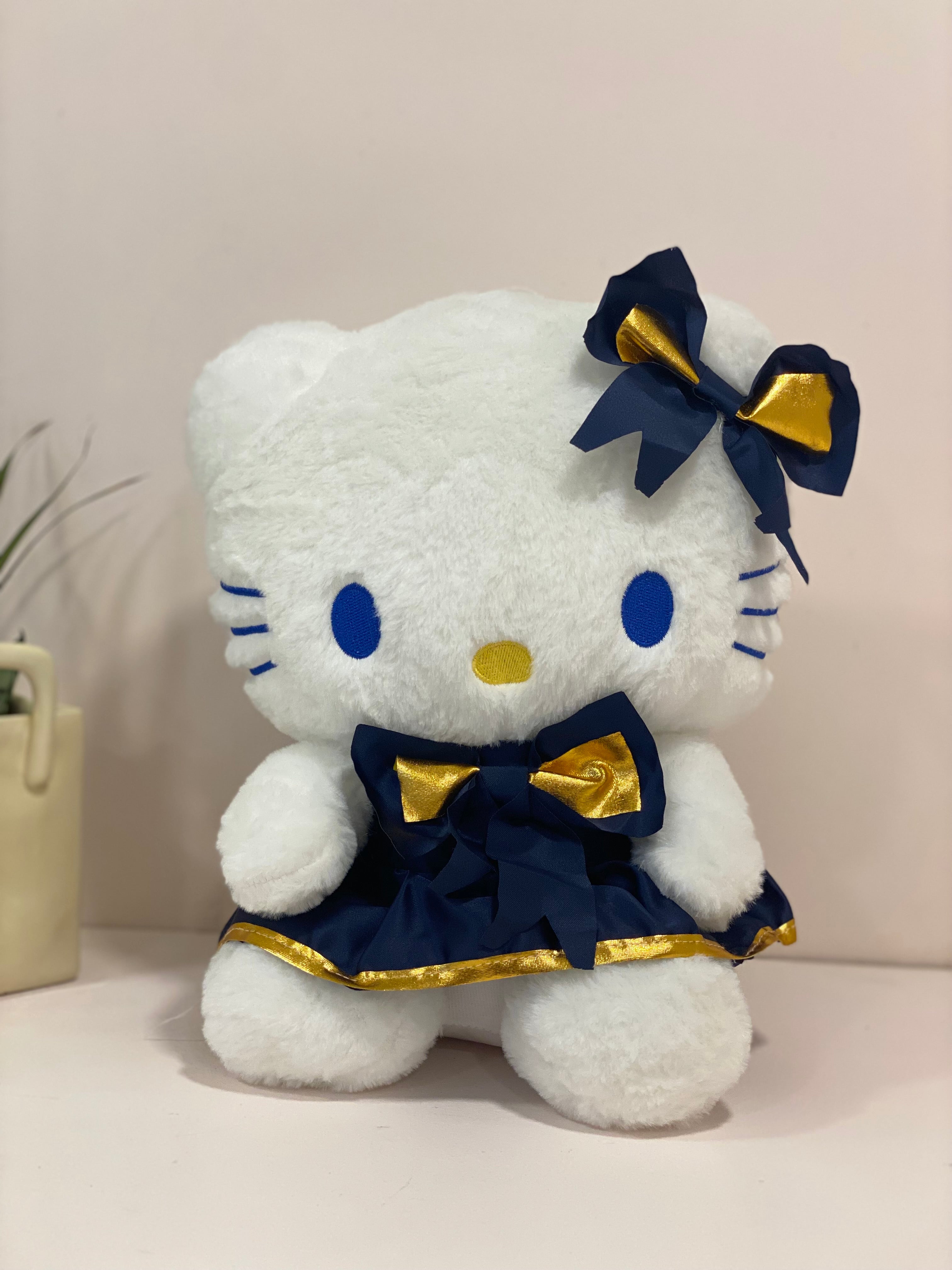 Cute Blue Bow Cat Plush Toy – Soft Stuffed Kitty Doll with Dress & Flowers (Kids & Gift Edition)