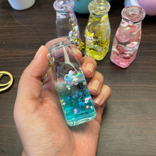 Load image into Gallery viewer, Cute animal Glitter Bottle Shape Keychain
